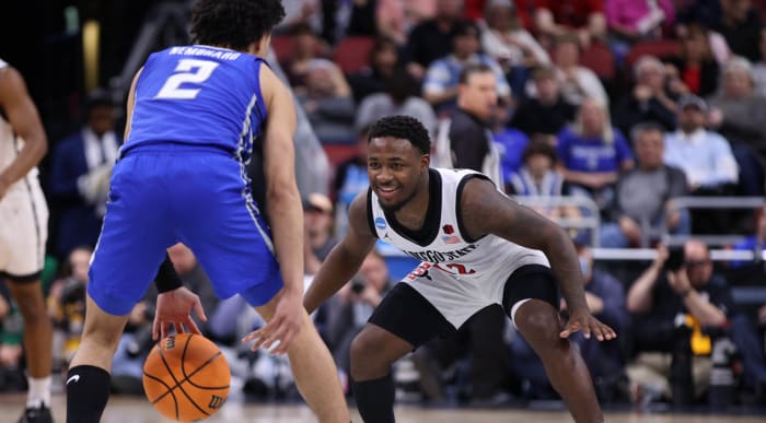 San Diego State guard Darrion Trammell defends Creighton guard Ryan Nembhard